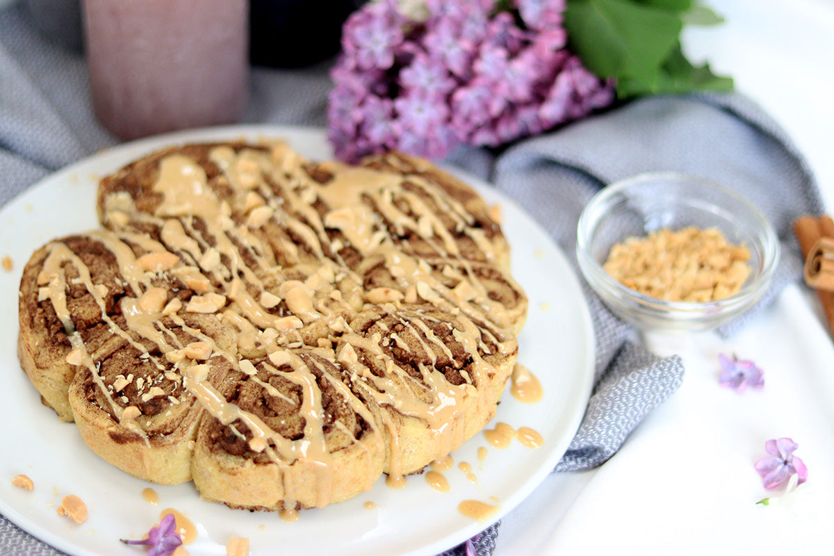 Cinnamon roll drizzled with caramel
